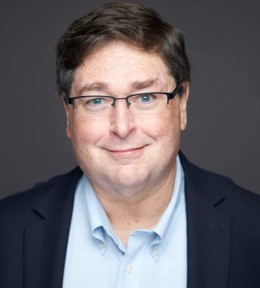 John C. Kane, Chairman of the Board and Co-founder